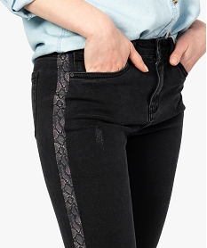 jeans femme skinny finition frangee a bandes imprimees python noir pantalons jeans et leggings9092601_2