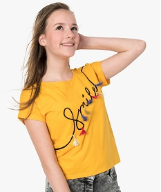 tee-shirt fille loose a dos long arrondi et motifs a sequins jaune9387901_1