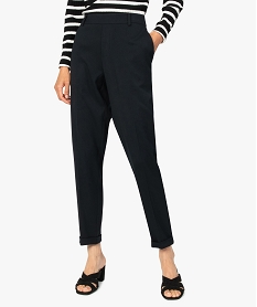 GEMO Pantalon femme uni coupe carotte avec revers cousus Noir