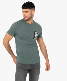 GEMO Tee-shirt homme avec motif XXL au dos – Jurassic World vert standard
