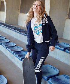GEMO Tee-shirt fille ample à manches courtes avec inscription patinée  –  Camps United blanc chine