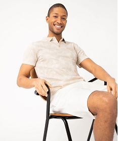 GEMO Polo manches courtes à fines rayures et motif feuillage homme blanc chine