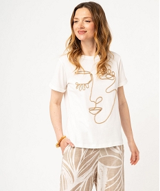 GEMO Tee-shirt manches courtes avec motif visage brodé femme blanc chine